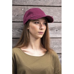 Zniszczona czapka taty